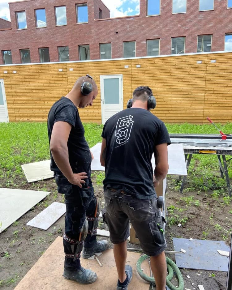 Master craftsman working on decorative tiles